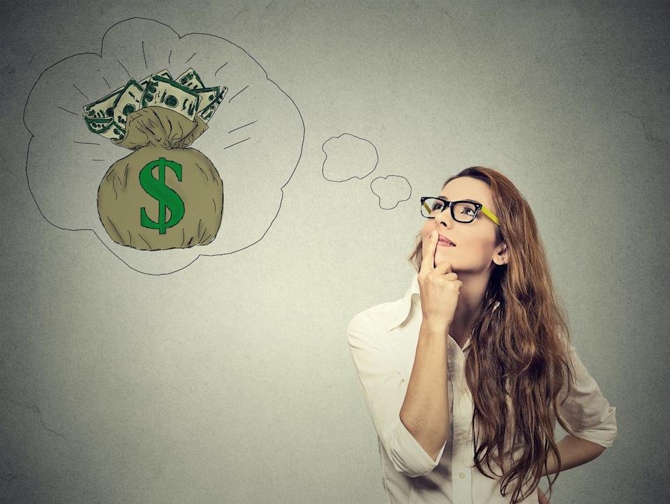 A person looks at an illustration of a bag of cash inside a thought bubble.