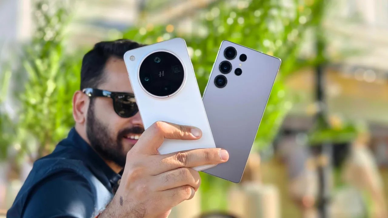 Prakhar Khanna holding the Oppo Find X8 Ultra and Samsung Galaxy S25 Ultra