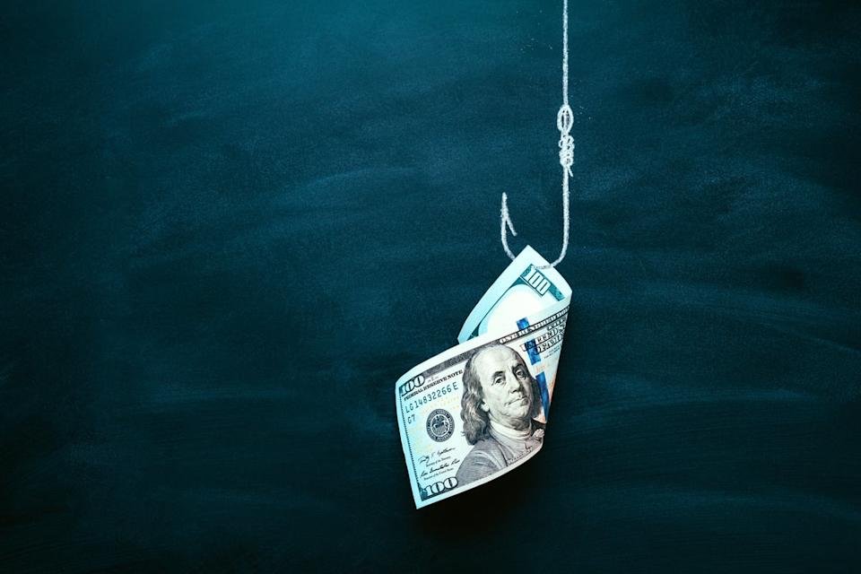 Money on a fishing hook.