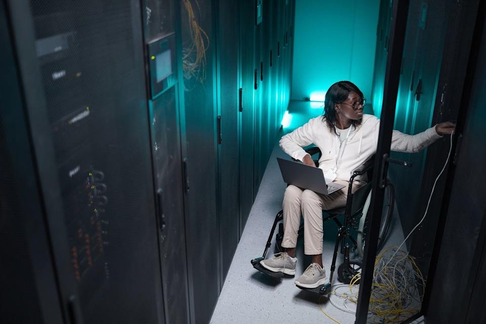 Person working in a data center. 